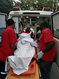 Citizen TV cameraman Reuben Ogachi is taken to hospital after being attacked. (Jakob Elkana)