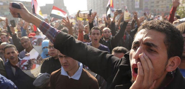 Supporters of the Muslim Brotherhood and ousted Egyptian President Mohamed Morsi shout slogans against the military and government during a protest in Cairo on November 28, 2014. (Reuters/Mohamed Abd El Ghany)