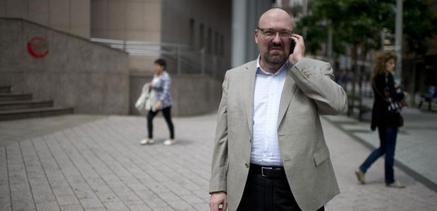 Mario Costeja Gonzalez speaks on his mobile phone outside a court in Barakaldo, Spain, on June 25, 2013. As a result of a lawsuit he filed against Google, Internet companies can be made to remove irrelevant or excessive personal information from search engine results, Europe's top court ruled.  (Reuters/Vincent West)