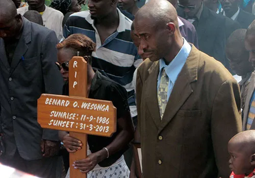 Friends and family gather for the funeral of Bernard Wesonga in April 2013. The journalist died in suspicious circumstances in 2013, but CPJ has not been able to confirm a link to his work. (CPJ/Tom Rhodes)
