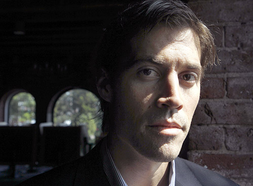 James Foley, pictured in 2011. One year after his murder, CPJ reflects on his career and what changes have been made to improve protection for freelance journalists. (AP/Steven Senne)