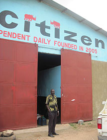 Nhial Bol, the editor-in-chief of The Citizen, stands in front of the daily's offices. The newspaper has been ordered to stop printing until further notice. (CPJ)