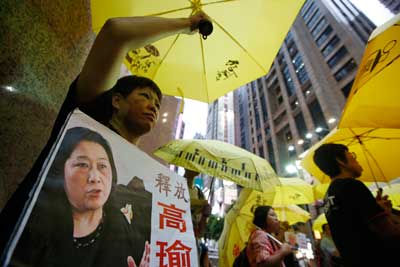 Anti-Beijing protesters in Hong Kong demand the release of jailed journalist Gao Yu on July 23. (AP/Kin Cheung)