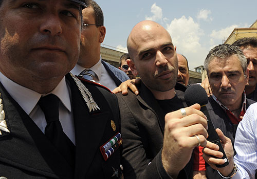 Roberto Saviano, author of Gomorrah, arrives for a court hearing. The Italian writer has been under police protection since 2006 because of threats from a Naples crime syndicate.  (AFP/Francesco Pischetola)