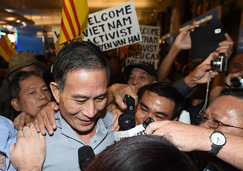 Vietnamese blogger Nguyen Van Hai arrives in Los Angeles in October 2014 after being released from jail and forced into exile. The U.S. says trade deals will depend on human rights but press freedom conditions remain poor in Vietnam. (AFP/Robyn Beck)