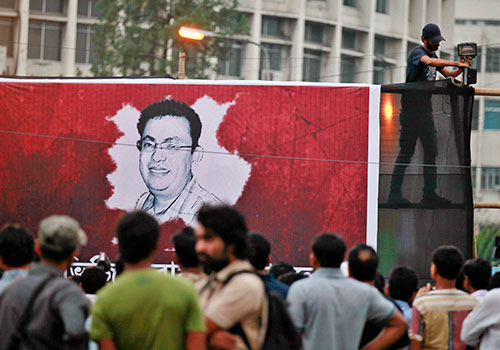 Une peinture murale d'Avijit Roy à Dhaka, l'un des quatre blogueurs assassinés par des extrémistes au Bangladesh cette année. (AP/A.M. Ahad)
