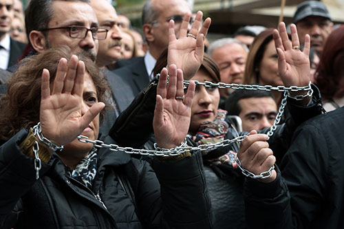 Turkish journalists protest the arrest of their colleagues Can Dündar and Erdem Gül, in Ankara, November 27, 2015 (AP/Burhan Ozbilici).