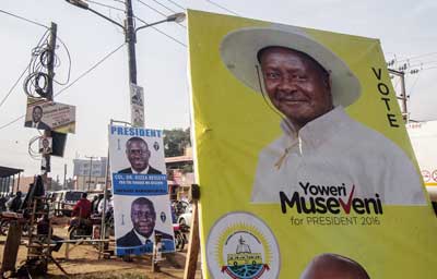 A photo taken on February 11, 2016 shows election posters of incumbent President Yoweri Museveni and opposition leader Kizza Besigye in Kampala. (Isaac Kasamani/AFP)