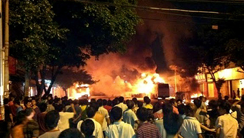 During clashes in Guangzhou in 2011, censors were told to push positive reports and suppress critical posts. (STR/AFP)