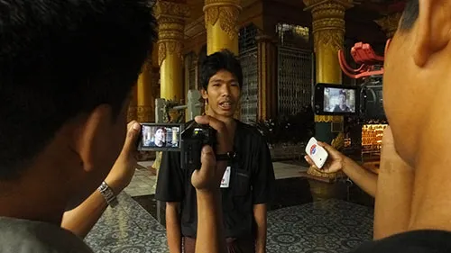 Min Min, editor and general manager of the online Root Investigative Agency, speaks to reporters in Sittwe, Myanmar, in this 2014 file photo (Root Investigative Agency).