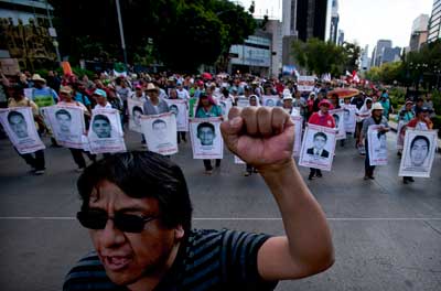 Violence has spiked in Guerrero state, where Francisco Pacheco Beltrán was killed. Pictured, relatives protest the disappearance of 43 students in the state in 2014. (AP/Marco Ugarte)