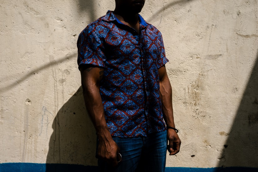 S., a gay refugee, outside his home in Nairobi. In Kenya, reporting on LGBT issues brings security risks. (Jake Naughton)