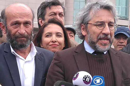 Can Dündar (right), editor of Cumhuriyet newspaper, and Ankara Bureau Chief Erdem Gül, speak to reporters before their May 6, 2016, sentencing hearing in Istanbul. (Özgür Öğret)