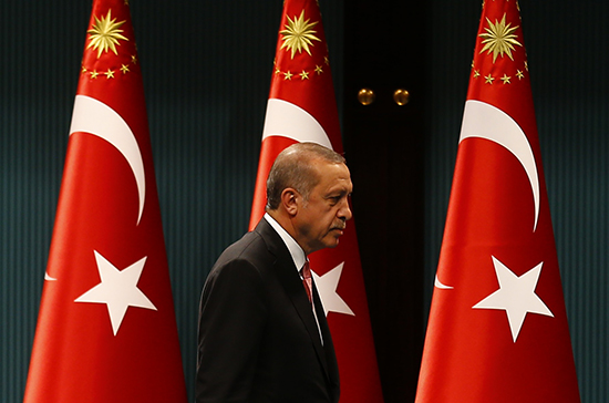 Turkish President Recep Tayyip Erdoğan leaves a press conference in Ankara, July 20, 2016 (Reuters/Umit Bektas)