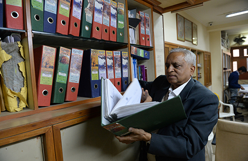 Subhash Agrawal looks through files at his office in Delhi. The activist has used the Right to Information Act to expose cases of wrongdoing. (AFP/Sajjad Hussain)