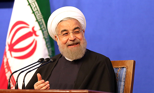 President Hassan Rouhani, pictured at a press conference in March 2016, has submitted a draft bill to parliament that proposes creating a state-regulated organization to oversee the country's press. (AFP/Atta Kenare)