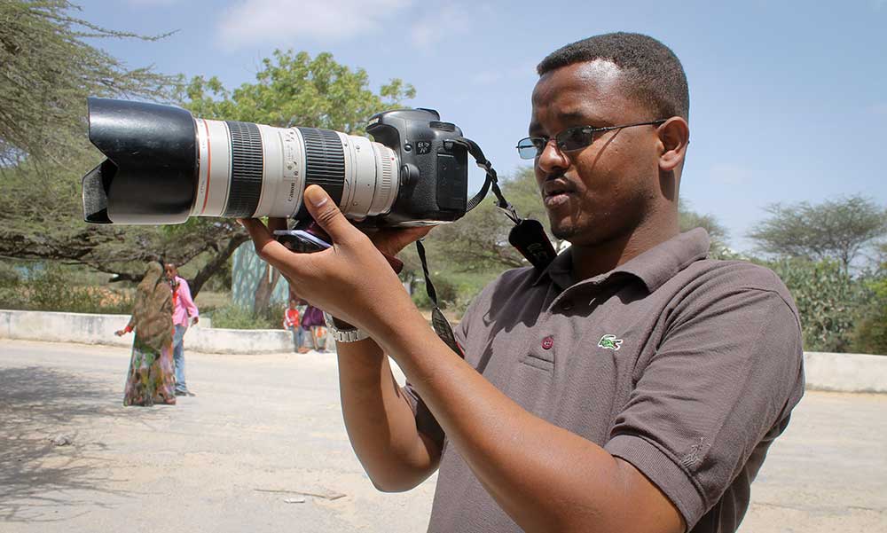 Universal TV reporter Mohamed Mohamud, pictured in January 2013. Al-Shabaab militants are the leading suspect in his murder and many other Somali press killings.  (AP/Farah Abdi Warsameh/File)