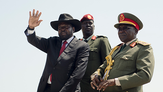 South Sudanese President Salva Kiir, shown on the left in this September 12, 2016, file photo, has severely cracked down on the country's news media. (AP/Jason Patinkin)