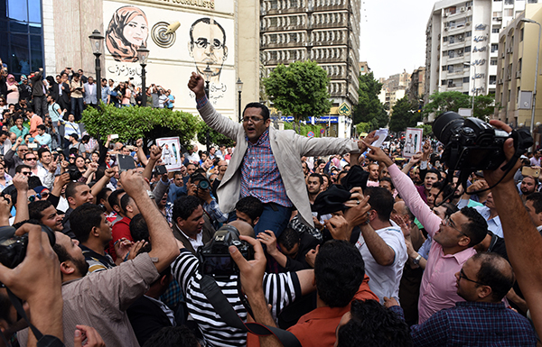 Khaled al-Balshy, board member of the Egyptian Journalists’ Syndicate, joins protests against a security raid on the group’s Cairo headquarters in May 2016. Amid Egypt’s crackdown, 25 journalists are behind bars. (AFP/ Mohamed el-Shahed)