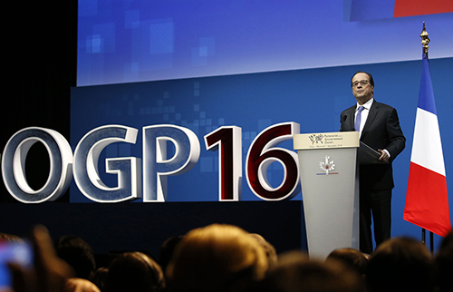 President François Hollande speaks at the opening of the Open Government Partnership summit in Paris in December, where press freedom was added to the agenda. (Jacky Naegelen/Pool/AFP)
