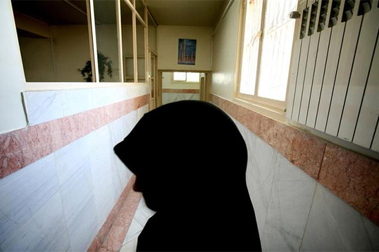 A guard stands in a hallway in the women's section of Tehran's Evin Prison, June 13, 2006. Journalist and activist Hengameh Shahidi was transferred to the prison last week. (Reuters/Morteza Nikoubazi)