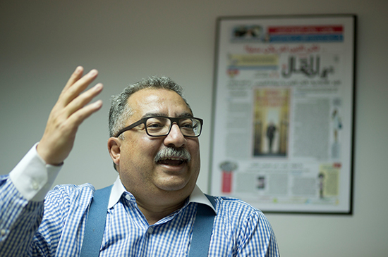 Ibrahim Eissa, editor of Al-Maqal newspaper, gestures in his office in Cairo, November 10, 2016. (AP/Amr Nabil)