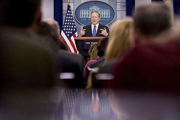 White House press secretary Sean Spicer talks to the media during the daily briefing. President Trump and his administration have accused critical outlets of being fake news. (AP Photo/Andrew Harnik)