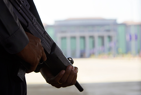 Police stand guard outside the National Reconciliation and Peace Center in Naypyitaw, March 1, 2017. (AP Photo/Aung Shine Oo)