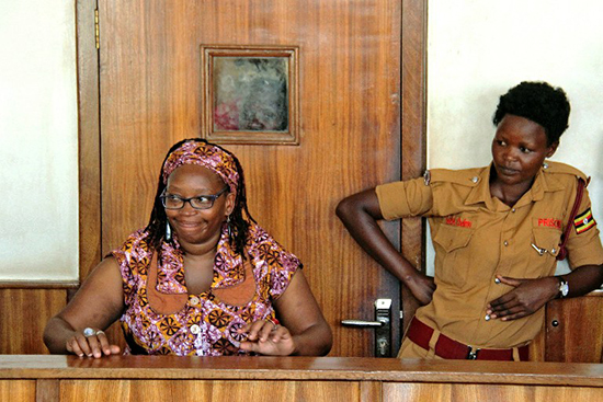 Academic Stella Nyanzi defends herself in a Kampala court on charges stemming from her critical remarks online about Ugandan President Yoweri Museveni, April 10, 2017. Journalist Gertrude Uwitware has faced threats, abduction, and assault for her writing in support of Nyanzi. (AFP/Gael Grilhot)
