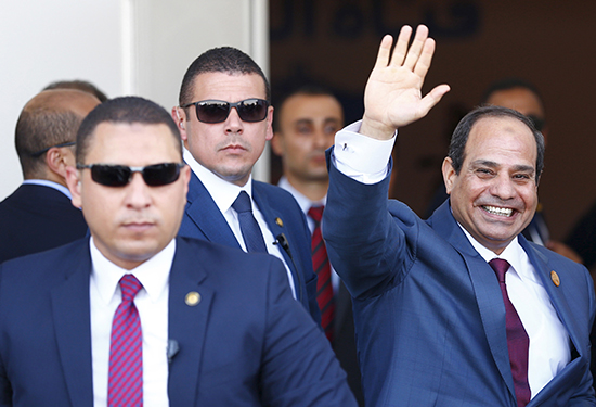 Ahmed Farouk is jailed pending trial on suspicion that he played a role in leaking audio recordings purportedly featuring Egyptian President Abdel Fattah el-Sisi, shown here in an August 6, 2015, ceremony inaugurating improvements to the Suez Canal, to a pro-opposition satellite TV station. (Reuters/Amr Dalsh)