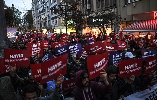 Supporters of the 'No' campaign in Turkey's referendum protest in Istanbul on April 17. At least three journalists covering opposition to the vote have been detained. (AFP/Bulent Kilic)