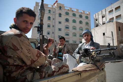 Houthis fighters secure a road between Hodeidah and Sanaa in Yemen on April 19, 2017. Journalists have been threatened and attacked in areas controlled by the Houthis. (AP/Hani Mohammed)
