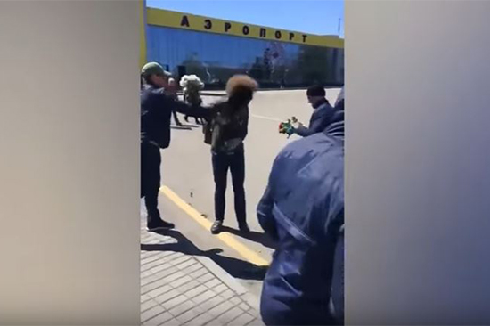 A still image created from a video shows an unknown assailant throwing an antiseptic at Russian blogger Ilya Varlamov at Stavropol airport, April 26, 2017.