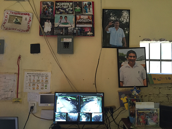 Photos of Moises Sánchez surround a security system installed by Mexico’s protection mechanism for journalists after his murder. (CPJ/Miguel Ángel Díaz)