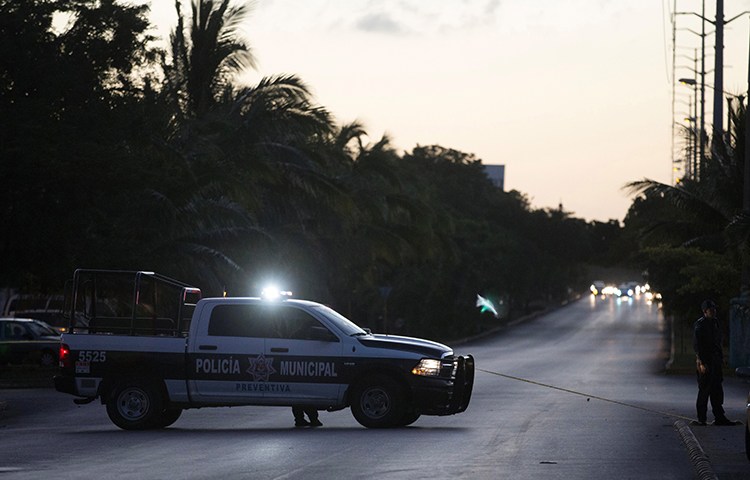 In this file photo, municipal police block a street in Cancun, Quintana Roo, Mexico, January 17, 2017. (Reuters/Victor Ruiz Garcia)