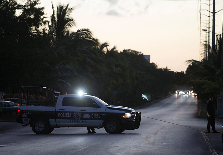In this file photo, municipal police block a street in Cancun, Quintana Roo, Mexico, January 17, 2017. (Reuters/Victor Ruiz Garcia)