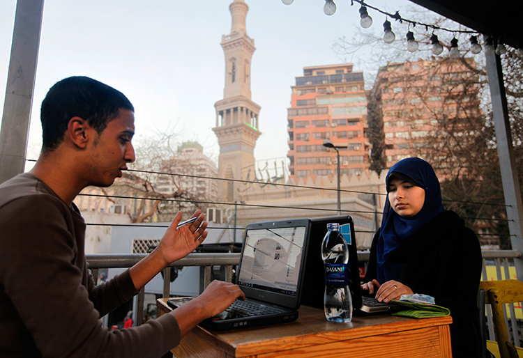 In this file photo, Egyptians access the internet at a community center in Cairo, February 9, 2013. (AP/Amr Nabil)