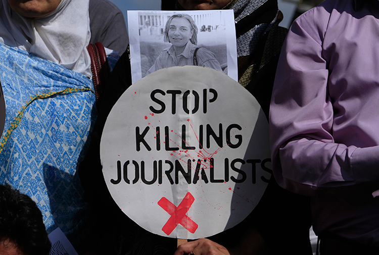 Journalists protest the killing of their colleagues at a demonstration in Islamabad, Pakistan, April 7, 2014. (Reuters/Faisal Mahmood)