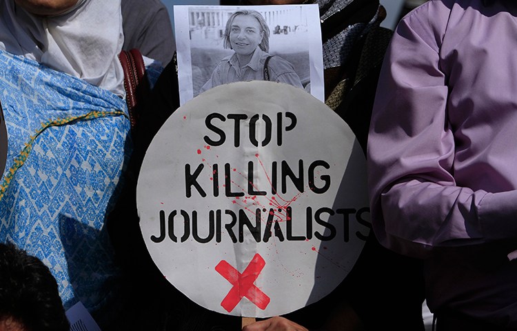 Journalists protest the killing of their colleagues at a demonstration in Islamabad, Pakistan, April 7, 2014. (Reuters/Faisal Mahmood)