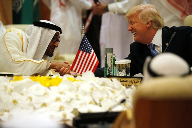 Crown Prince of Abu Dhabi Mohammed Bin Zayed al-Nahyan, who is also deputy commander of the UAE armed forces, shakes hands with U.S. President Donald Trump at a meeting of the Gulf Cooperation Council in Riyadh, Saudi Arabia, May 21, 2017. (Reuters/Jonathan Ernst)