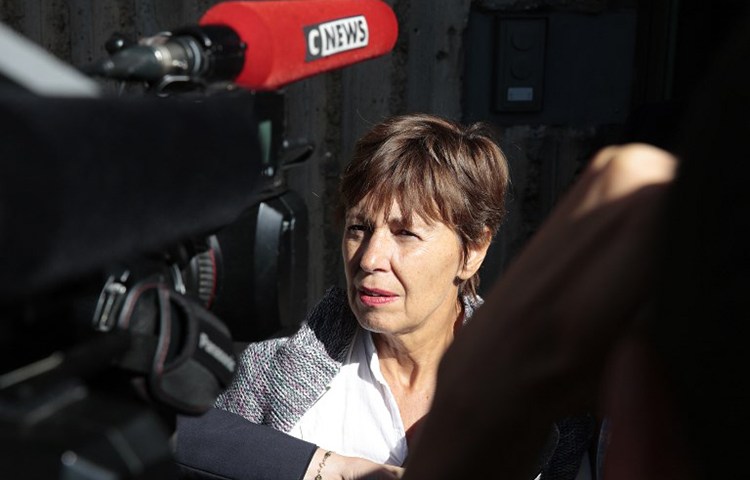 Mathias Depardon's mother, Daniele Van de Lanotte, speaks to reporters outside Turkey's Embassy to France, May 25, 2017. (AFP/Geoffroy Van Der Hasselt)
