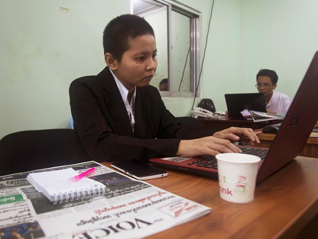 Journalists work in The Voice's office in Yangon, Myanmar, June 5, 2017. (AP/Thein Zaw)