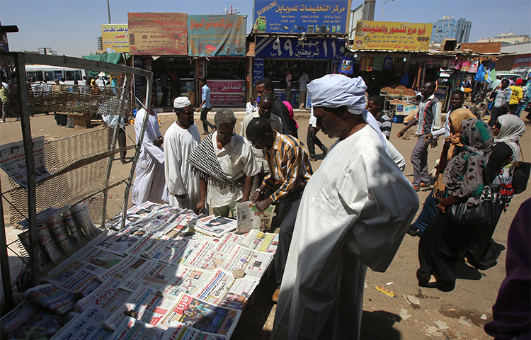 Newspapers are sold on a Khartoum street in 2015. Sudanese authorities ordered copies of a newspaper to be confiscated this week over its critical reporting. (AFP/Ashraf Shazly)