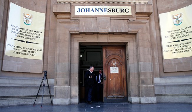 Lawyers leave the Johannesburg High Court in this March 2015 file photograph. (Reuters/Siphiwe Sibeko)