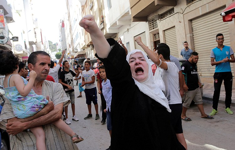 A woman shouts slogans in a protest in the Moroccan town of Al-Hoceima, July 21, 2017. (Reuters/Youssef Boudlal)