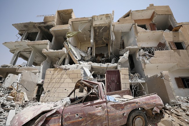 A damaged building is seen in Raqqa, Syria, July 28, 2017. (Reuters/Rodi Said)