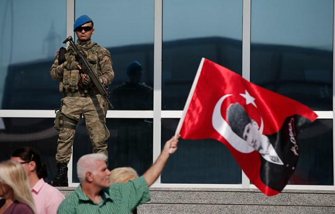 Protesters in Silivri, Turkey demonstrate in support of journalists and staff from the Cumhuriyet newspaper who Turkish officials have accused of aiding terror organizations. Their trial is part of a larger media crackdown under President Recep Tayyip Erdoğan. (AP Photo/Emrah Gurel)