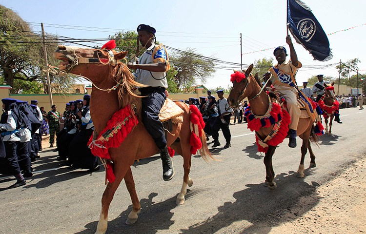 Somaliland police ride horses during independence celebrations in Hargeisa in 2013. Authorities in the region are detaining a journalist on false news accusations. (Reuters/Feisal Omar)