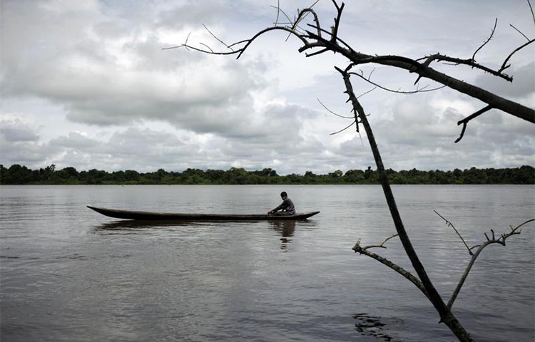 A Warao man fishes on the Orinoco Delta in 2009. A group of journalists from the indigenous community are running a news website to cover issues affecting the Venezuelan region. (Reuters/Jorge Silva)