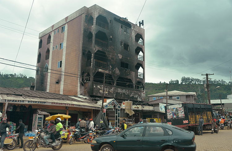 A hotel destroyed by fire during protests in Bamenda. Journalists reporting on unrest in Cameroon’s English-speaking regions risk being charged under the country’s anti-terror law. (AFP/Reinnier Kaze)